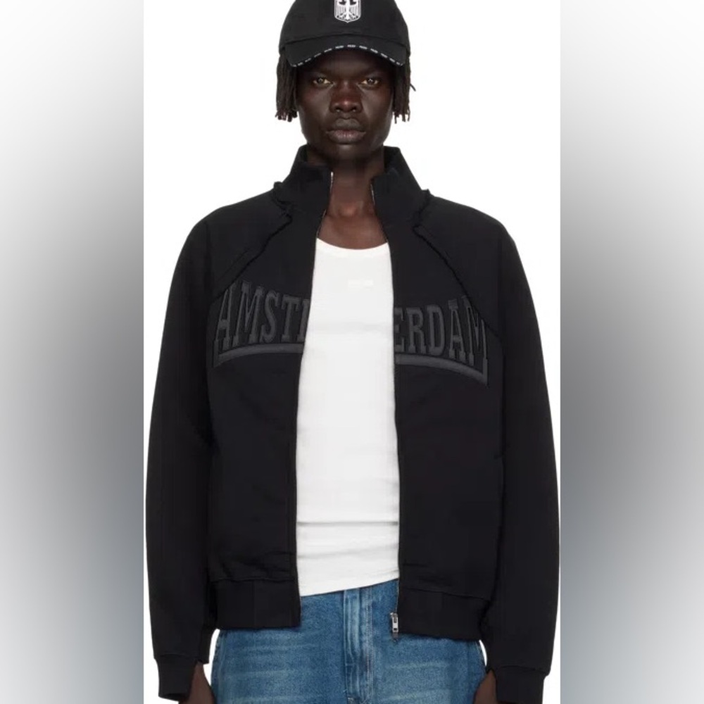 VETEMENTS
Black 'amsterdam' Patched Zip Sweatshirt